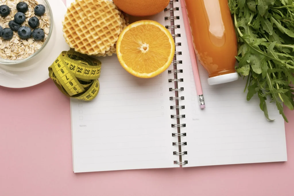 meal planning notepad food assortment scaled 1